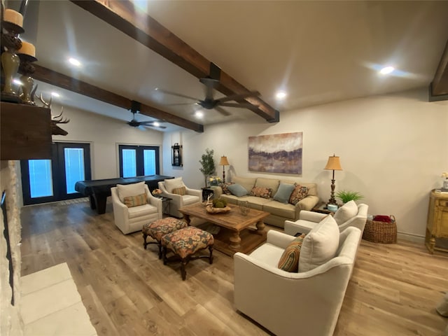 cinema room with french doors, light wood-type flooring, pool table, and beam ceiling