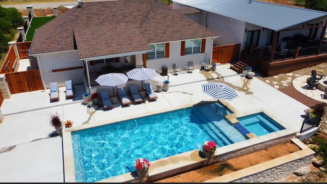 view of swimming pool featuring a patio area and an outdoor living space