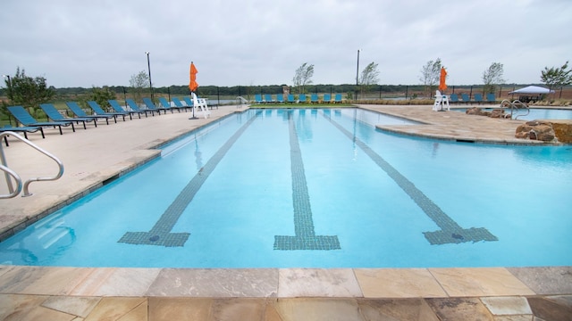 view of pool with a patio area