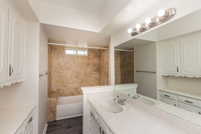 2404 Windsor Pl, Plano, TX 75075 - full bathroom featuring vanity, tub / shower combination, and wood finished floors
