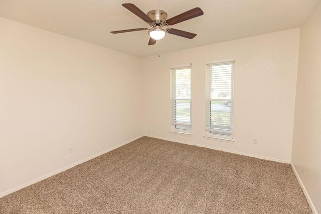 2404 Windsor Pl, Plano, TX 75075 - carpeted empty room featuring a ceiling fan and baseboards