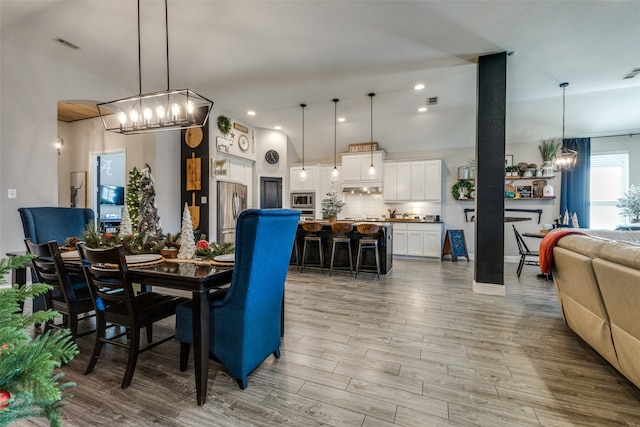 dining space featuring light hardwood / wood-style flooring