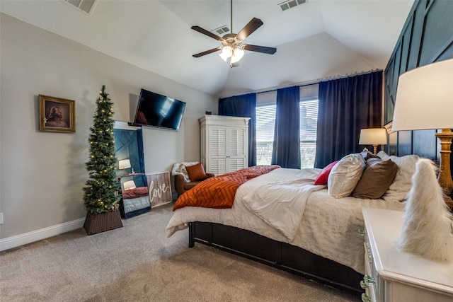 bedroom featuring ceiling fan, light carpet, and lofted ceiling