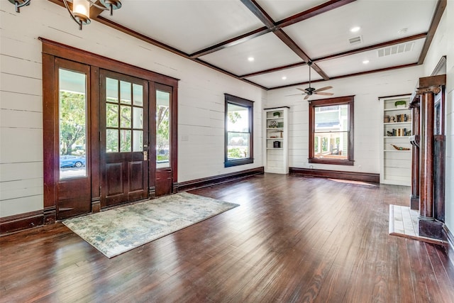 entryway featuring ceiling fan, coffered ceiling, beamed ceiling, dark hardwood / wood-style floors, and wood walls