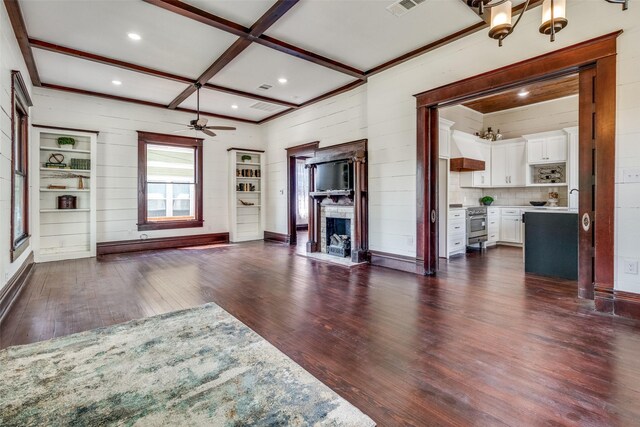 living room with beamed ceiling, ceiling fan, dark hardwood / wood-style flooring, and coffered ceiling