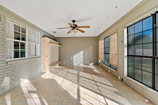 interior space featuring ceiling fan