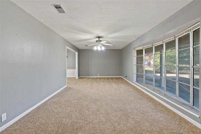 2680 Hubbard St, Paris, TX 75460 - carpeted empty room with baseboards and ceiling fan
