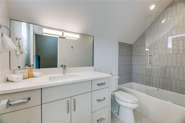 full bathroom featuring combined bath / shower with glass door, vanity, toilet, and lofted ceiling