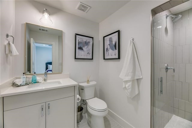 bathroom with toilet, vanity, and walk in shower