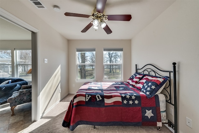 bedroom featuring ceiling fan