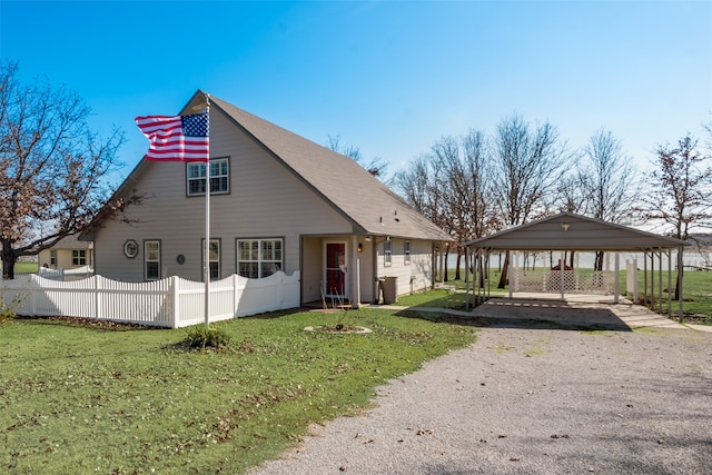 view of front of property with a gazebo and a front lawn