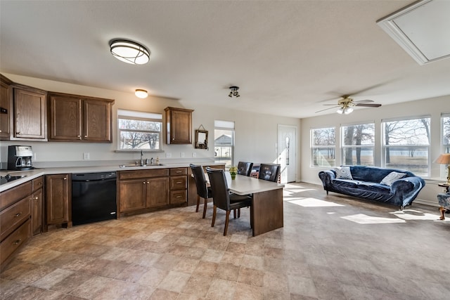 kitchen with dishwasher, ceiling fan, and sink