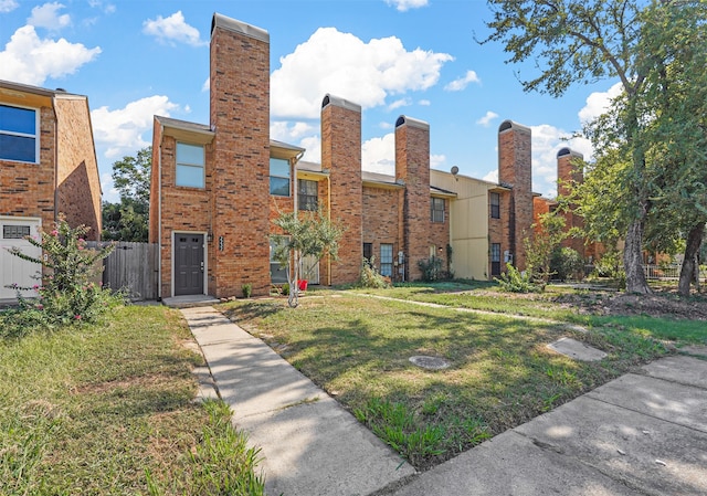 view of front of house with a front yard