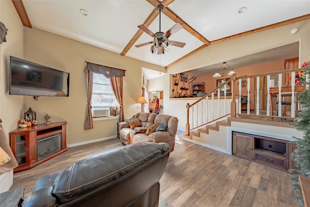 living room with ceiling fan, cooling unit, lofted ceiling with beams, and hardwood / wood-style flooring