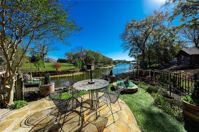 view of patio / terrace with a water view