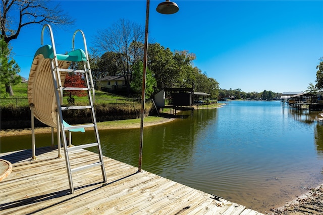 view of dock with a water view