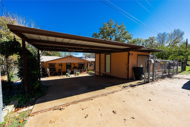 view of car parking featuring a carport