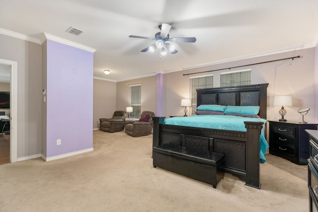 carpeted bedroom featuring ceiling fan and ornamental molding