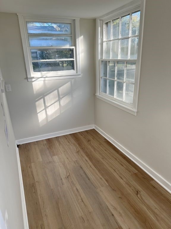 unfurnished dining area with hardwood / wood-style floors