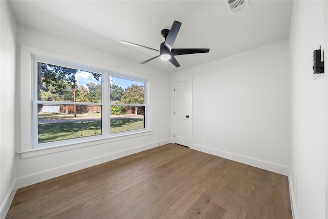 unfurnished room featuring wood-type flooring and ceiling fan