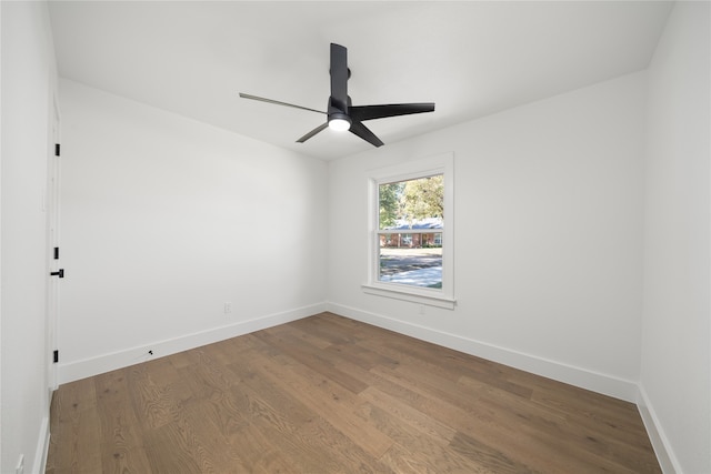 unfurnished room featuring wood-type flooring and ceiling fan