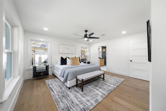 bedroom with hardwood / wood-style flooring and ceiling fan