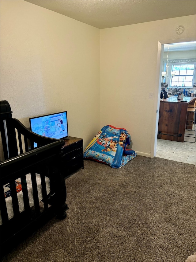 bedroom with light carpet