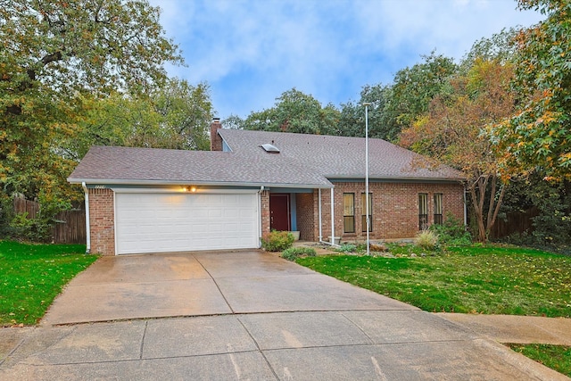 ranch-style house with a front lawn and a garage