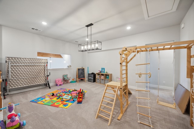 recreation room with carpet floors