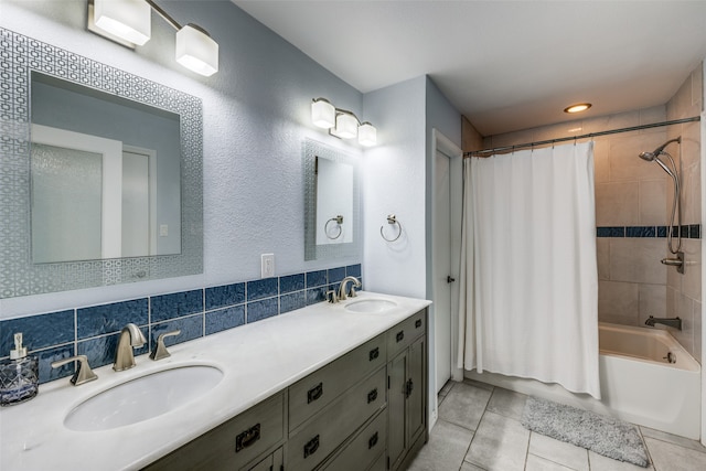 bathroom featuring tile patterned flooring, vanity, backsplash, and shower / tub combo with curtain