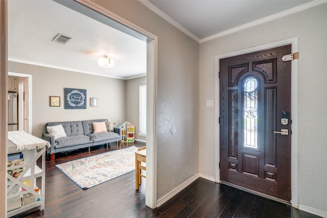 entryway featuring a healthy amount of sunlight, crown molding, and dark wood-type flooring