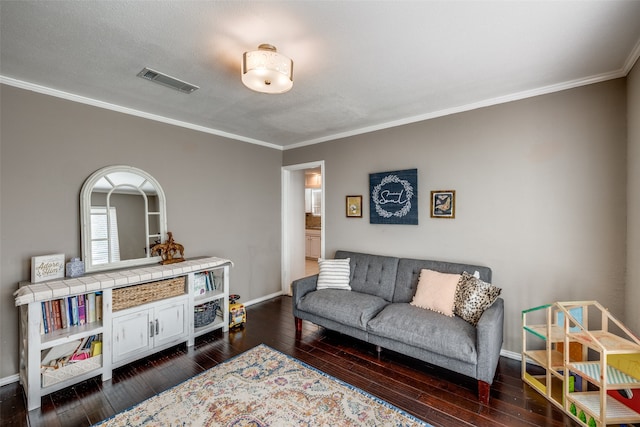 living room featuring a textured ceiling, dark hardwood / wood-style floors, and ornamental molding