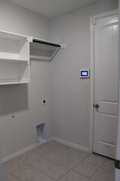 empty room featuring ceiling fan, carpet floors, and vaulted ceiling