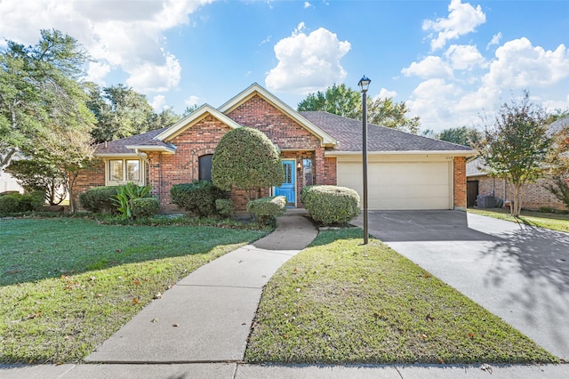 view of front of home with central AC unit, a garage, and a front lawn