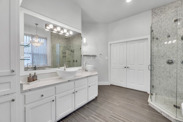 7170 Fm 1830, Argyle, TX 76226 - full bathroom with vanity, a stall shower, and a chandelier
