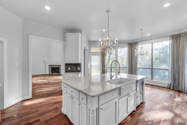 7170 Fm 1830, Argyle, TX 76226 - kitchen with a chandelier, dishwasher, dark wood finished floors, recessed lighting, and white cabinets