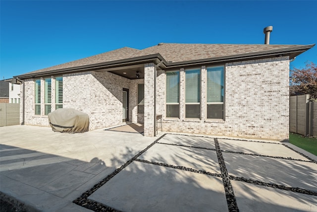 back of property featuring a patio area