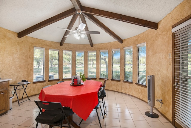 sunroom / solarium with vaulted ceiling with beams and ceiling fan