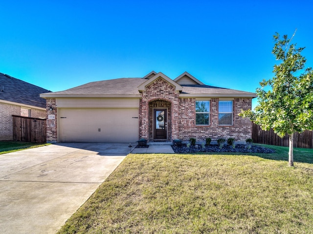 single story home with a garage and a front yard