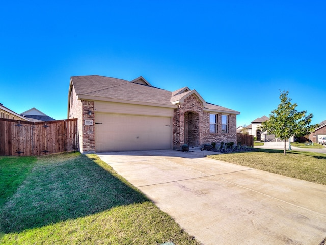 single story home featuring a front yard and a garage