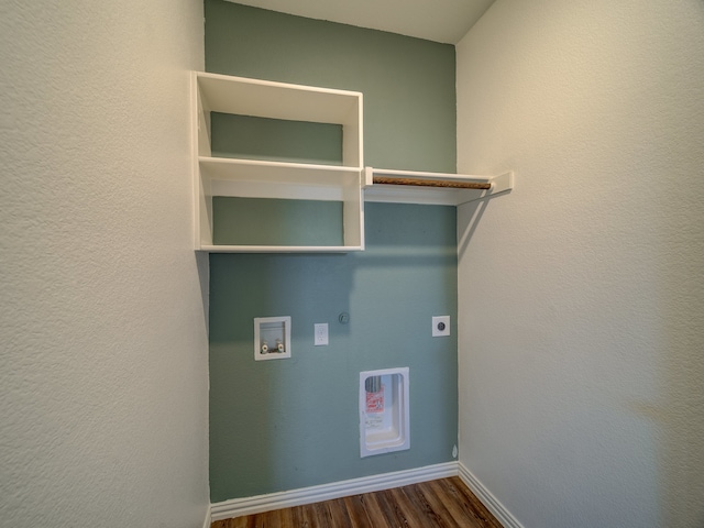 laundry room with hookup for an electric dryer, hookup for a gas dryer, dark hardwood / wood-style flooring, and hookup for a washing machine