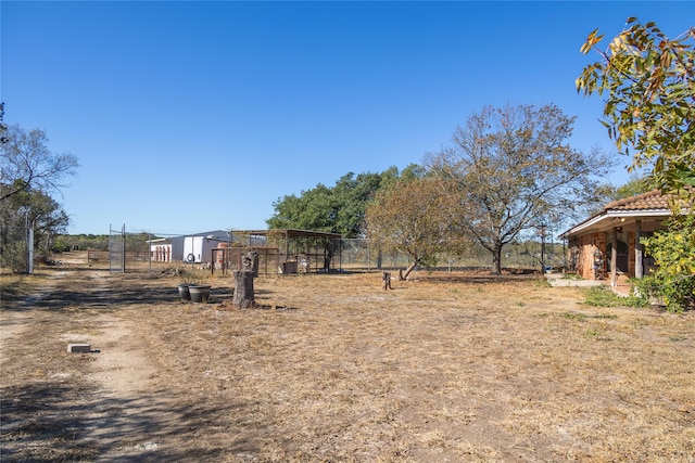 view of yard featuring a rural view