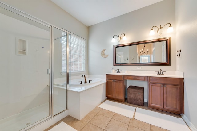 bathroom featuring tile patterned floors, vanity, and plus walk in shower