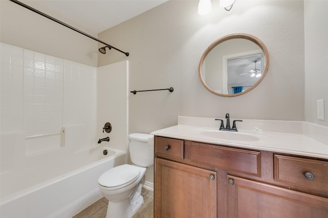 full bathroom with ceiling fan, washtub / shower combination, tile patterned floors, toilet, and vanity