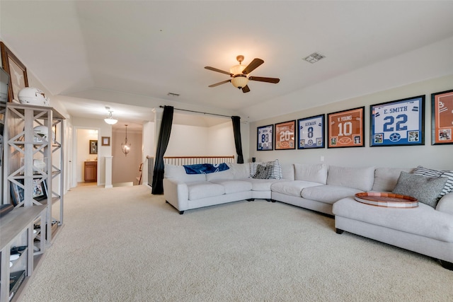 living room featuring carpet flooring, ceiling fan, and lofted ceiling