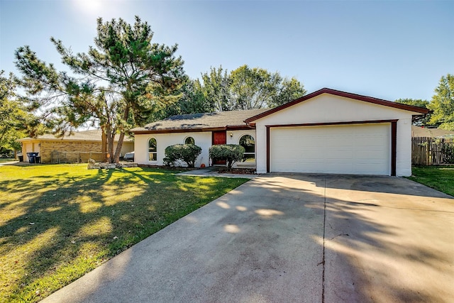 ranch-style home with a garage and a front yard