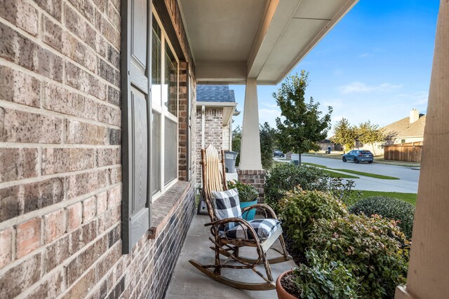 balcony featuring covered porch