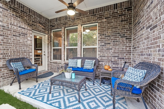 view of patio with ceiling fan and an outdoor hangout area