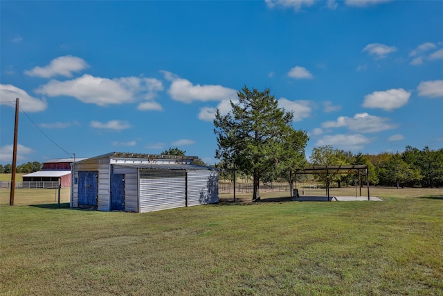 view of yard with an outdoor structure