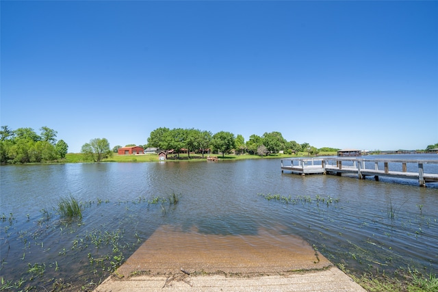 dock area featuring a water view